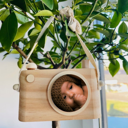 Houten fotocamera met hengsel