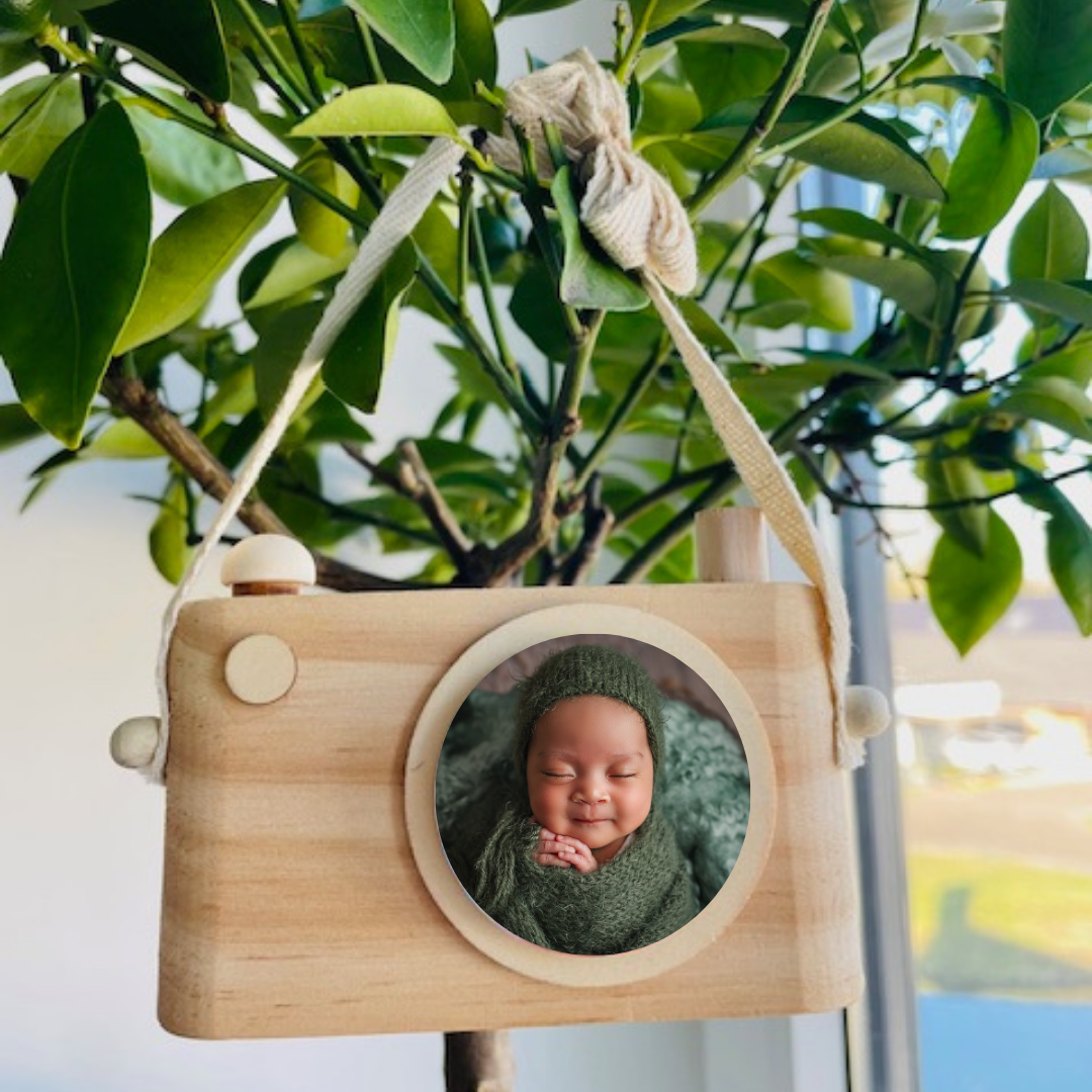 Houten fotocamera met hengsel