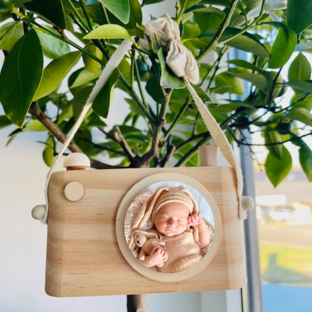 Houten fotocamera met hengsel